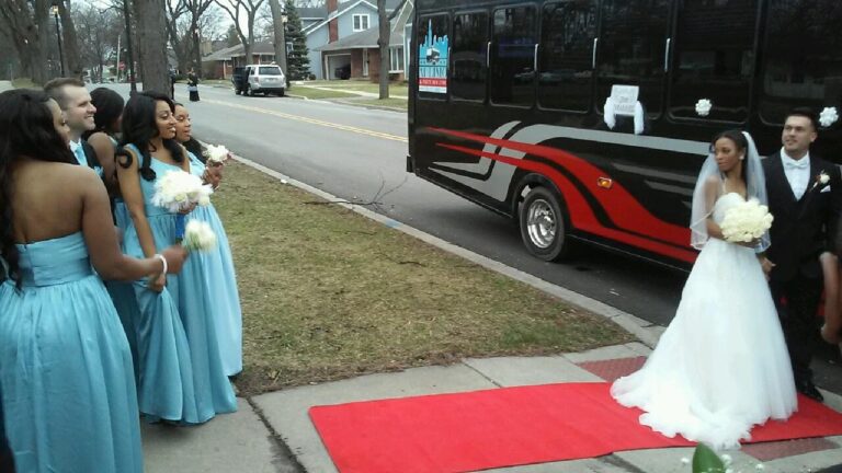 "Luxurious wedding transportation featuring a beautifully decorated vintage car adorned with fresh flowers and elegant ribbons, parked against a scenic background. The car is ready to whisk the couple away, adding a timeless and romantic touch to their special day.