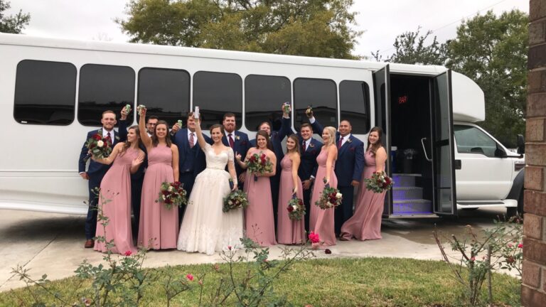 "Luxurious wedding transportation featuring a beautifully decorated vintage car adorned with fresh flowers and elegant ribbons, parked against a scenic background. The car is ready to whisk the couple away, adding a timeless and romantic touch to their special day.